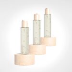 Clear cosmetic bottle with wooden cap on neutral background